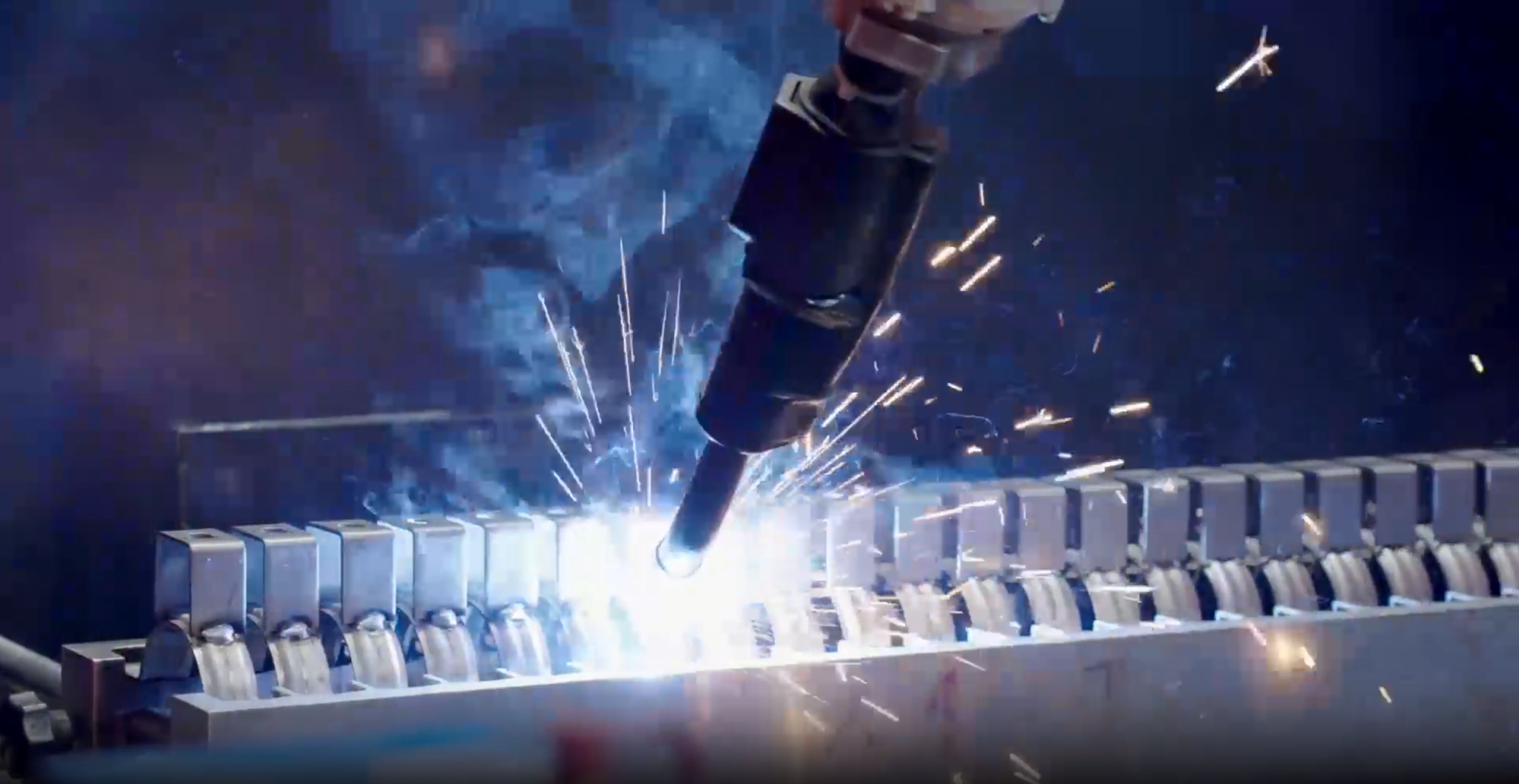 Automated robot welding process at MTK Pipe Clamps factory, ensuring precise and durable clamp production for global projects